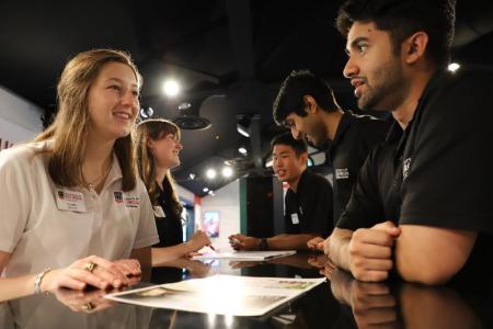 Claire Bunn (left) working at the UGA Visitors' Center